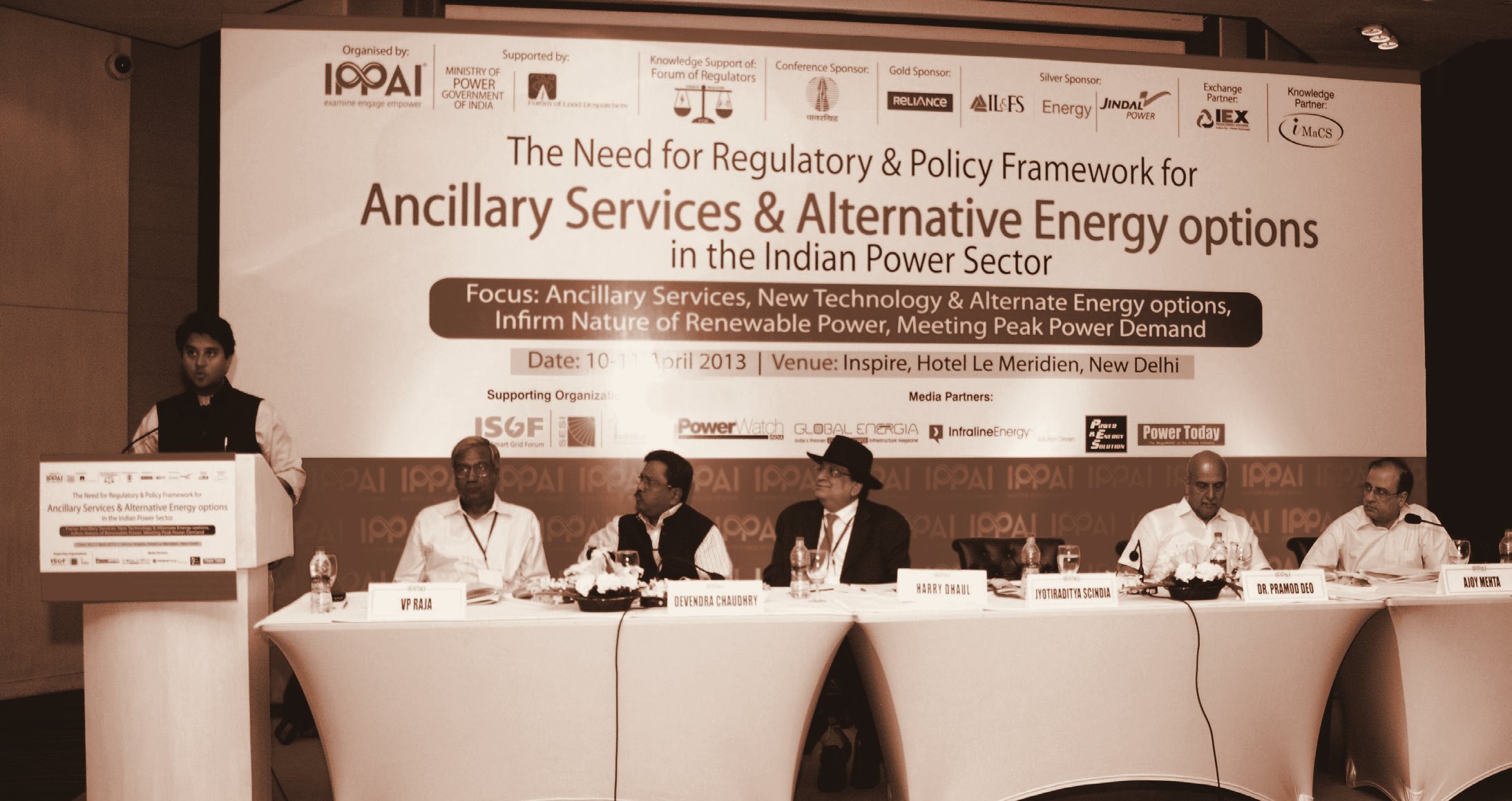 Power Minister Shri Jyotiraditya Scindia delivers the inaugural address, Ancillary Services conference, New Delhi, April 2013 — the first of its kind in India. At the table: V P Raja, Chairman, MERC; Devendra Chaudhry, Additional Secretary, Ministry of Power; Harry Dhaul, Director General, IPPAI; Dr Pramod Deo, Chairman, CERC; Ajoy Mehta, Managing Director, MSEDCL.