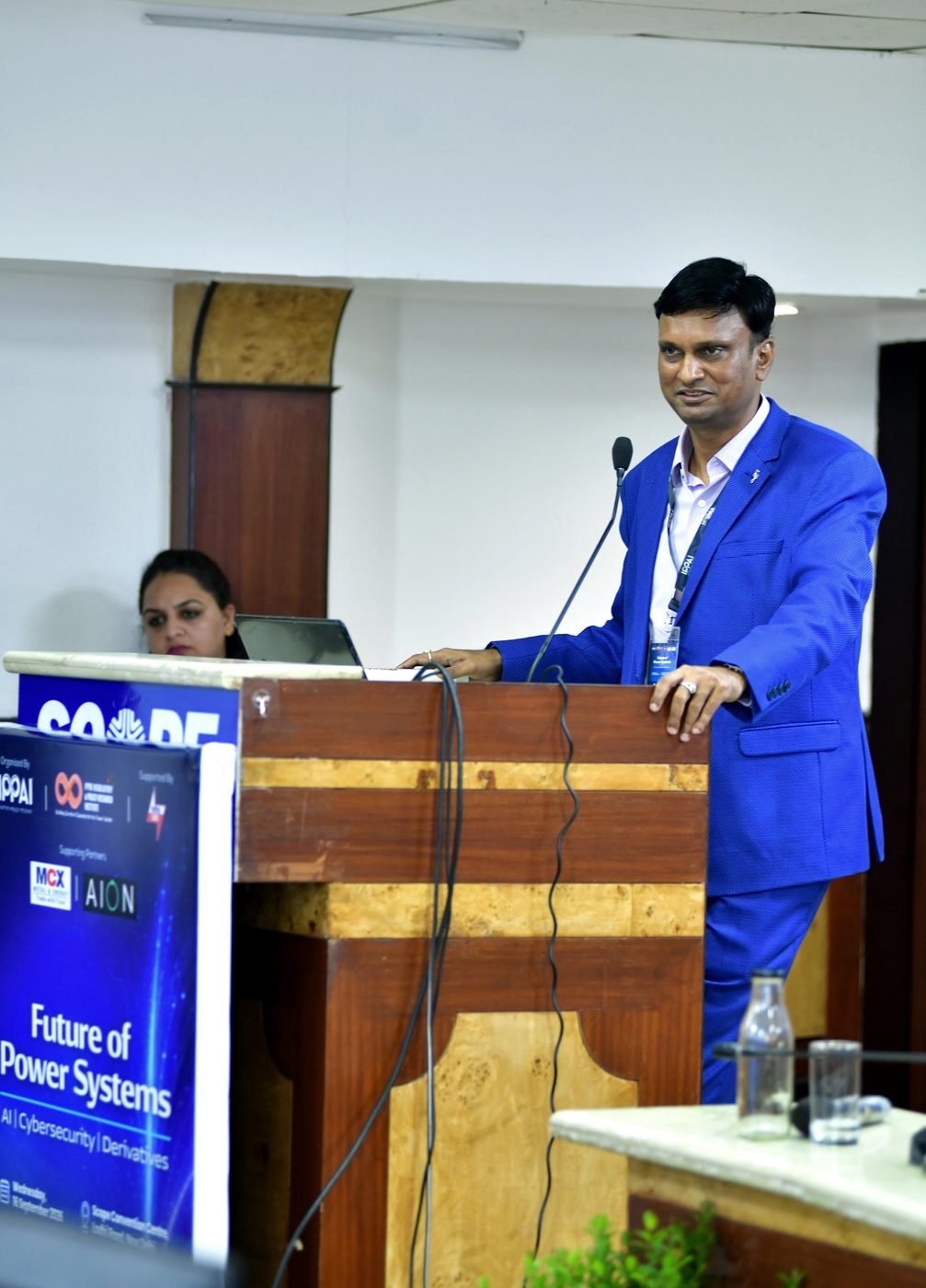 Future of Power Systems 2026: a speaker at the podium.